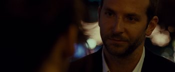 Movie still from “Silver Linings Playbook” (2012), directed by David O. Russell – A man in a suit and tie; Close Up shot, Over the shoulder angle