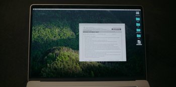 Movie still from “Smile” (2022), directed by Parker Finn – A computer screen with a computer screen showing a computer screen; Extreme Close Up shot, High angle