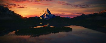 Movie still from “Sonic the Hedgehog 2” (2022), directed by Jeff Fowler – A view of a mountain and a body of water at sunset; Extreme Wide shot, Low angle