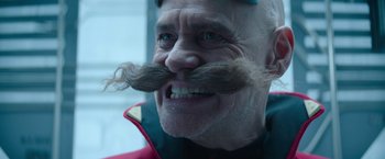 Movie still from “Sonic the Hedgehog 2” (2022), directed by Jeff Fowler – An old man with a mustache and a beard; Close Up shot, Low angle