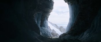 Movie still from “Sonic the Hedgehog 2” (2022), directed by Jeff Fowler – A view of a mountain from inside a cave; Extreme Wide shot, Low angle