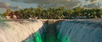 Movie still from “Sonic the Hedgehog 2” (2022), directed by Jeff Fowler – A person standing on a wooden bridge over a waterfall; Extreme Wide shot, High angle