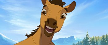 Movie still from “Spirit: Stallion of the Cimarron” (2002), directed by Lorna Cook – A horse's face with mountains in the background; Close Up shot, Low angle