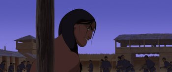 Movie still from “Spirit: Stallion of the Cimarron” (2002), directed by Lorna Cook – An animated picture of a woman looking at a crowd; Medium shot, Over the shoulder angle