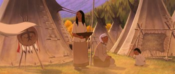 Movie still from “Spirit: Stallion of the Cimarron” (2002), directed by Lorna Cook – Two native american women standing in front of teepees; Medium shot, Over the shoulder angle