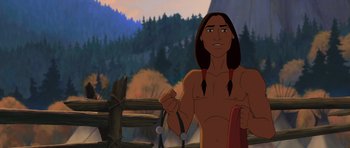 Movie still from “Spirit: Stallion of the Cimarron” (2002), directed by Lorna Cook – An animated picture of a native american holding a knife; Medium shot, Over the shoulder angle