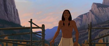 Movie still from “Spirit: Stallion of the Cimarron” (2002), directed by Lorna Cook – An animated man standing in front of a mountain range; Medium shot, Over the shoulder angle