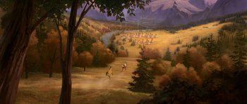 Movie still from “Spirit: Stallion of the Cimarron” (2002), directed by Lorna Cook – Two people riding horses in a field with trees and mountains in the background; Extreme Wide shot, High angle