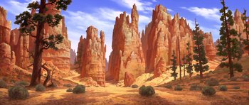 Movie still from “Spirit: Stallion of the Cimarron” (2002), directed by Lorna Cook – An oil painting of a desert landscape with rocks and trees; Extreme Wide shot, Low angle