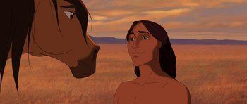 Movie still from “Spirit: Stallion of the Cimarron” (2002), directed by Lorna Cook – An animated picture of a woman and a horse; Close Up shot, Over the shoulder angle