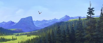 Movie still from “Spirit: Stallion of the Cimarron” (2002), directed by Lorna Cook – An eagle flying over a forest with mountains in the background; Extreme Wide shot, Low angle