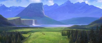 Movie still from “Spirit: Stallion of the Cimarron” (2002), directed by Lorna Cook – An oil painting of mountains and a lake with trees in the foreground; Extreme Wide shot, High angle