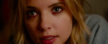 Movie still from “Spring Breakers” (2012), directed by Harmony Korine – A woman's face with blue eyes; Close Up shot, Overhead angle