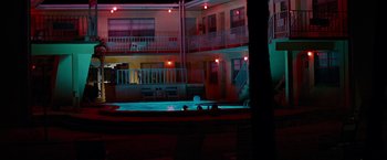 Movie still from “Spring Breakers” (2012), directed by Harmony Korine – A swimming pool in the middle of a motel room; Extreme Wide shot, High angle