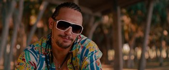 Movie still from “Spring Breakers” (2012), directed by Harmony Korine – A person wearing sunglasses; Close Up shot, Low angle