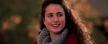 Movie still from “St. Elmo's Fire” (1985), directed by Joel Schumacher – A person wearing a jacket and a scarf; Close Up shot, Over the shoulder angle