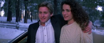 Movie still from “St. Elmo's Fire” (1985), directed by Joel Schumacher – A man and a woman standing next to each other; Medium shot, Low angle
