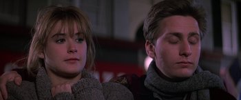 Movie still from “St. Elmo's Fire” (1985), directed by Joel Schumacher – A man and a woman sitting next to each other; Close Up shot, Over the shoulder angle