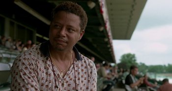 Movie still from “St. Vincent” (2014), directed by Theodore Melfi – A person wearing a shirt; Close Up shot, Over the shoulder angle