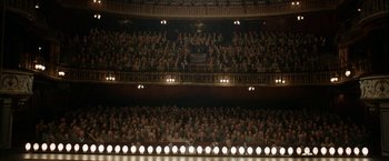 Movie still from “Stan & Ollie” (2018), directed by Jon S. Baird – A crowd of people sitting in a theater; Extreme Wide shot, High angle