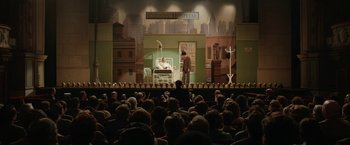 Movie still from “Stan & Ollie” (2018), directed by Jon S. Baird – A crowd of people sitting in front of a stage; Extreme Wide shot, High angle