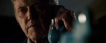 Movie still from “Stand Up Guys” (2012), directed by Fisher Stevens – An older woman holding a phone up to her ear; Close Up shot, Low angle