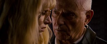 Movie still from “Stand Up Guys” (2012), directed by Fisher Stevens – An older man and a younger woman looking at each other; Close Up shot, Low angle