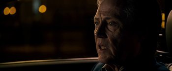 Movie still from “Stand Up Guys” (2012), directed by Fisher Stevens – An old man with a very sharp look on his face; Close Up shot, Over the shoulder angle