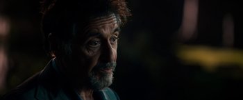 Movie still from “Stand Up Guys” (2012), directed by Fisher Stevens – A person with a beard; Close Up shot, Over the shoulder angle