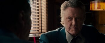 Movie still from “Stand Up Guys” (2012), directed by Fisher Stevens – An older man sitting in front of a window; Close Up shot, Over the shoulder angle