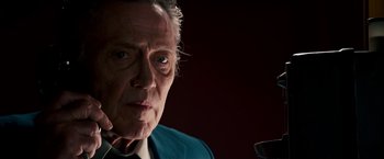 Movie still from “Stand Up Guys” (2012), directed by Fisher Stevens – An older man with a blue jacket looking at the camera; Close Up shot, Low angle