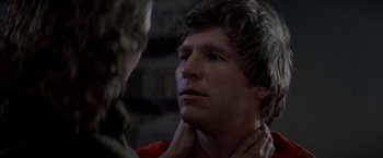 Movie still from “Starman” (1984), directed by John Carpenter – A man and a woman looking into each others eyes; Close Up shot, Over the shoulder angle