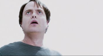 Movie still from “Super” (2010), directed by James Gunn – A person looking up at the sky; Close Up shot, Low angle