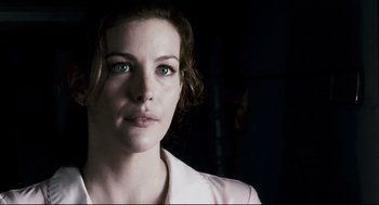 Movie still from “Super” (2010), directed by James Gunn – A person with blue eyes; Close Up shot, Over the shoulder angle