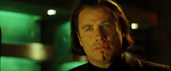 Movie still from “Swordfish” (2001), directed by Dominic Sena – A person with long hair; Close Up shot, Low angle