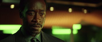 Movie still from “Swordfish” (2001), directed by Dominic Sena – A person wearing a suit and tie; Close Up shot, Low angle