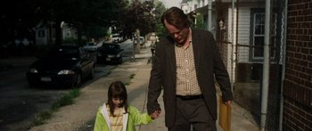 Movie still from “Synecdoche, New York” (2008), directed by Charlie Kaufman – A man and a little girl walking down the sidewalk; Medium shot, Over the shoulder angle
