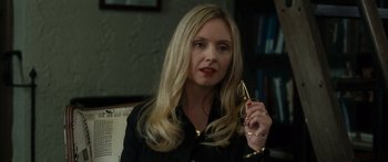 Movie still from “Synecdoche, New York” (2008), directed by Charlie Kaufman – A woman holding a pair of eye glasses in her hand; Close Up shot, High angle