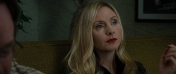 Movie still from “Synecdoche, New York” (2008), directed by Charlie Kaufman – A woman sitting in a chair looking to her left; Close Up shot, High angle