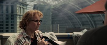 Movie still from “Synecdoche, New York” (2008), directed by Charlie Kaufman – An older woman holding a cell phone in her hand; Close Up shot, Over the shoulder angle