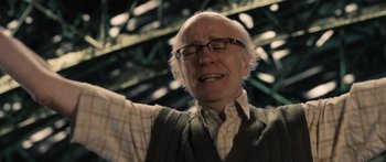 Movie still from “Synecdoche, New York” (2008), directed by Charlie Kaufman – An older man with glasses and a beard; Close Up shot, Low angle