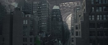 Movie still from “Synecdoche, New York” (2008), directed by Charlie Kaufman – An image of a city with a bridge in the background; Extreme Wide shot, High angle