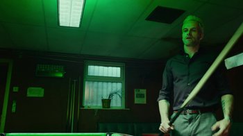 Movie still from “T2 Trainspotting” (2017), directed by Danny Boyle – A man standing in front of a billiard table; Medium shot, Low angle