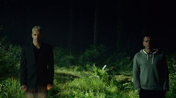 Movie still from “T2 Trainspotting” (2017), directed by Danny Boyle – Two men standing next to each other in the dark; Wide shot, Low angle