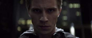 Movie still from “TRON: Legacy” (2010), directed by Joseph Kosinski – A man's face in the dark; Close Up shot, Low angle