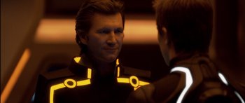 Movie still from “TRON: Legacy” (2010), directed by Joseph Kosinski – A man in a suit is looking at himself in the mirror; Close Up shot, Over the shoulder angle