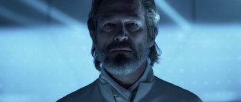 Movie still from “TRON: Legacy” (2010), directed by Joseph Kosinski – A person wearing a suit and tie; Close Up shot, Low angle