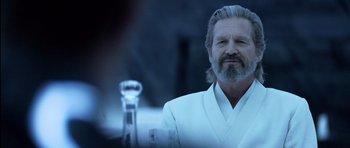 Movie still from “TRON: Legacy” (2010), directed by Joseph Kosinski – A person wearing a robe; Close Up shot, Over the shoulder angle