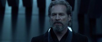 Movie still from “TRON: Legacy” (2010), directed by Joseph Kosinski – A person wearing a suit and tie; Close Up shot, Low angle
