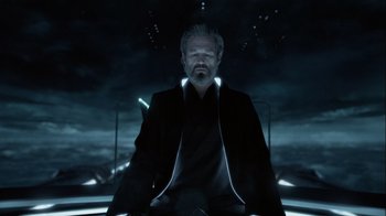 Movie still from “TRON: Legacy” (2010), directed by Joseph Kosinski – An image of a man in a dark place; Medium shot, Low angle